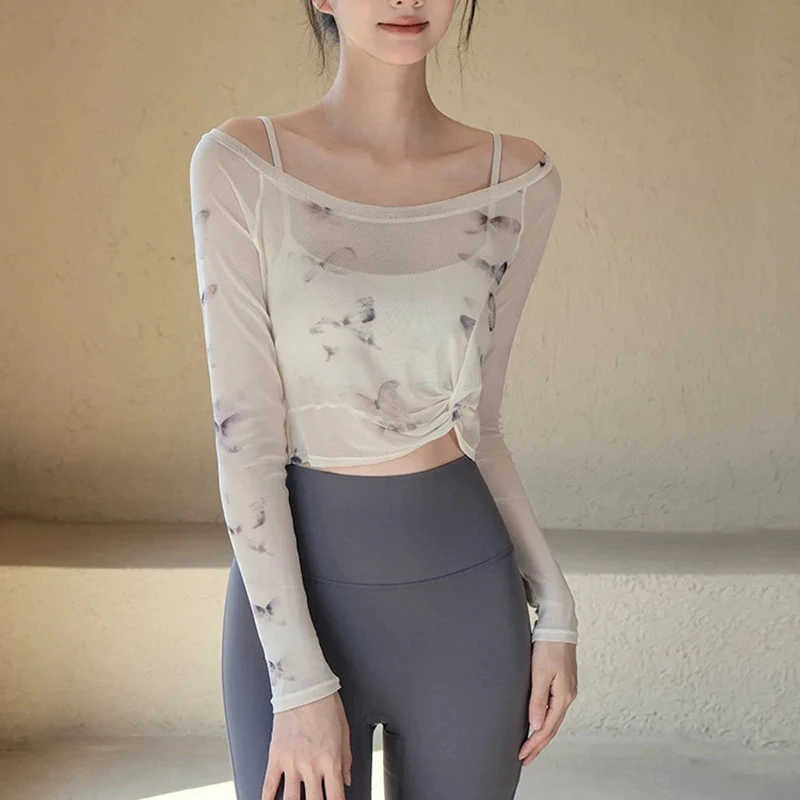 Women's High-End Long Sleeved Yoga Suit Set Mesh Butterfly Design Fake Two-Piece Slimming Fitness Top with Fixed Chest Cushion
Women's High-End Long Sleeved Yoga Suit Set Mesh Butterfly Design Fake Two-Piece Slimming Fitness Top with Fixed Chest Cushion