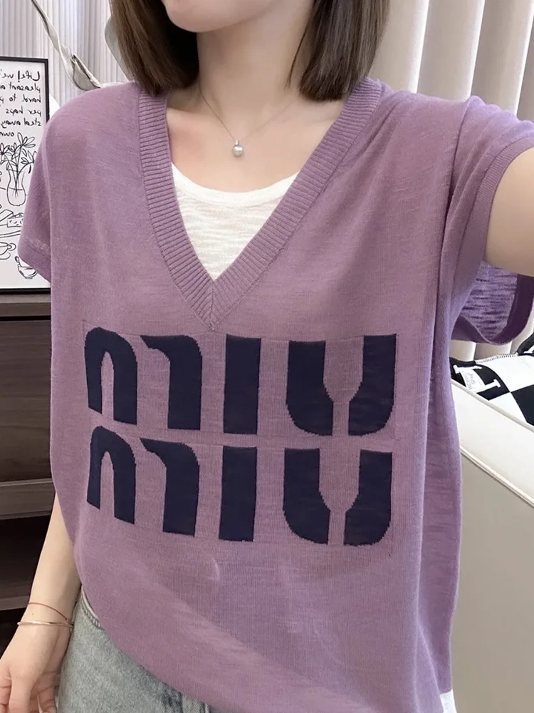 European V-neck fashion fake two-piece thin printed letter short sleeved T-shirt for women's summer new loose and slimming top
European V-neck fashion fake two-piece thin printed letter short sleeved T-shirt for women's summer new loose and slimming top