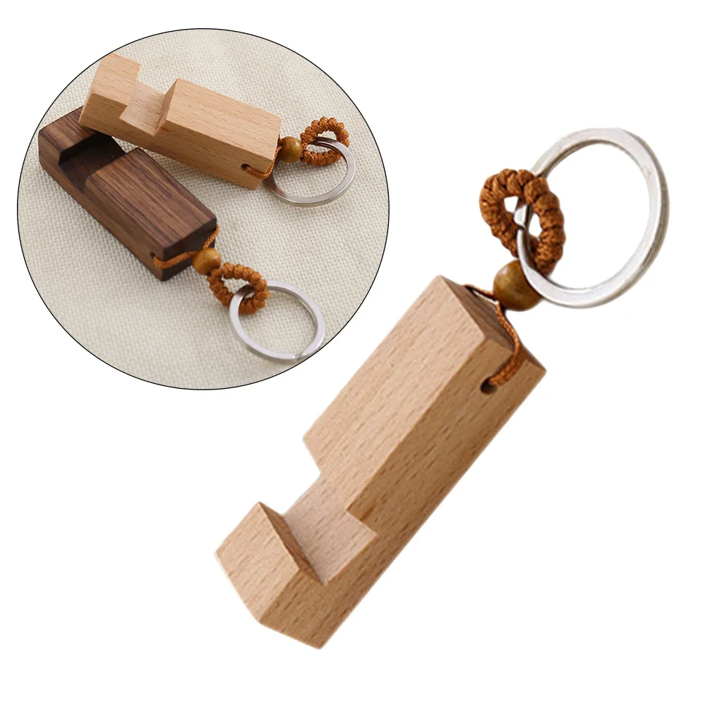 Wooden Phone Stand Keychain Lightweight Holder Desk Bracket Portable Smartphones Tablet Video Reading Charging
Wooden Phone Stand Keychain Lightweight Holder Desk Bracket Portable Smartphones Tablet Video Reading Charging