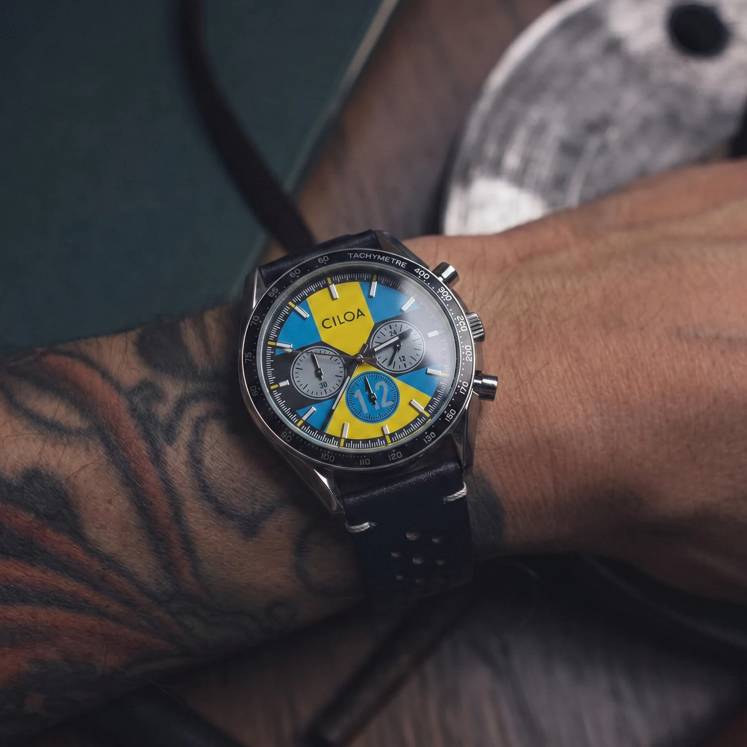 CILOA Men's Racing Chronograph Watch Vintage Blue & Yellow Dial Black Perforated Leather Strap Tachymeter Quartz Wristwatch
CILOA Men's Racing Chronograph Watch Vintage Blue & Yellow Dial Black Perforated Leather Strap Tachymeter Quartz Wristwatch