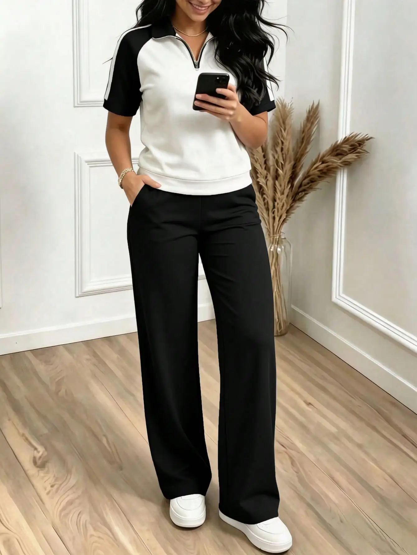 Spring/Summer women's new lapel half-zip sporty color-block short-sleeve top paired with casual daily elastic waist loose solid color pants two-piece set
Spring/Summer women's new lapel half-zip sporty color-block short-sleeve top paired with casual daily elastic waist loose solid color pants two-piece set