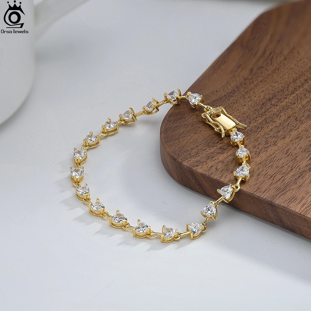 ORSA JEWELS S925 Серебро 3-4 мм Сверкающий овальный цирконий Теннисный браслет-цепочка Треугольный дизайн Женские украшения для повседневной носки SB211
ORSA JEWELS S925 Серебро 3-4 мм Сверкающий овальный цирконий Теннисный браслет-цепочка Треугольный дизайн Женские украшения для повседневной носки SB211