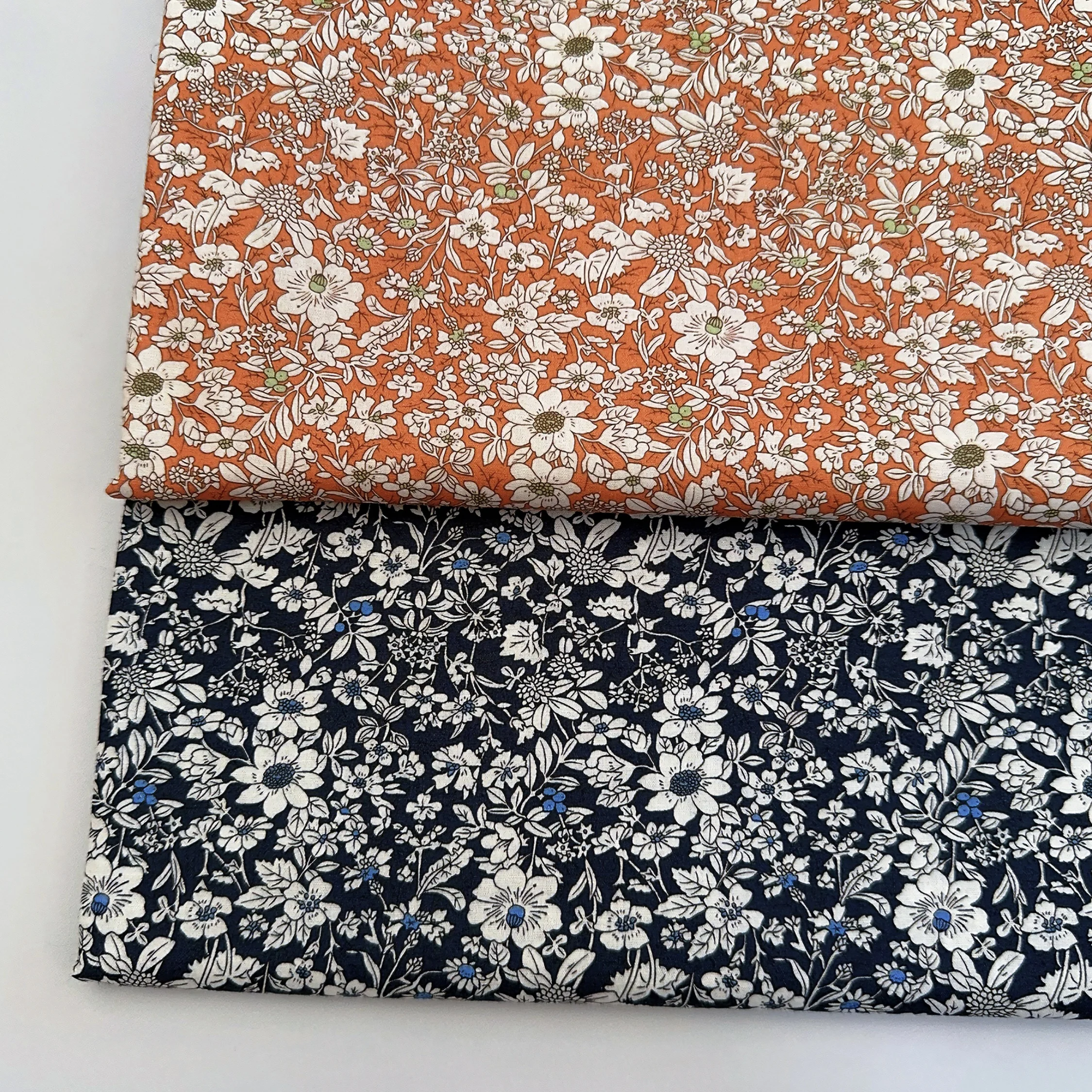 Cotton Floral Print Fabric Small Daisy Flower Lawn Fabric for Sewing Dressmaking DIY Craft Orange Navy Blue Color
Cotton Floral Print Fabric Small Daisy Flower Lawn Fabric for Sewing Dressmaking DIY Craft Orange Navy Blue Color