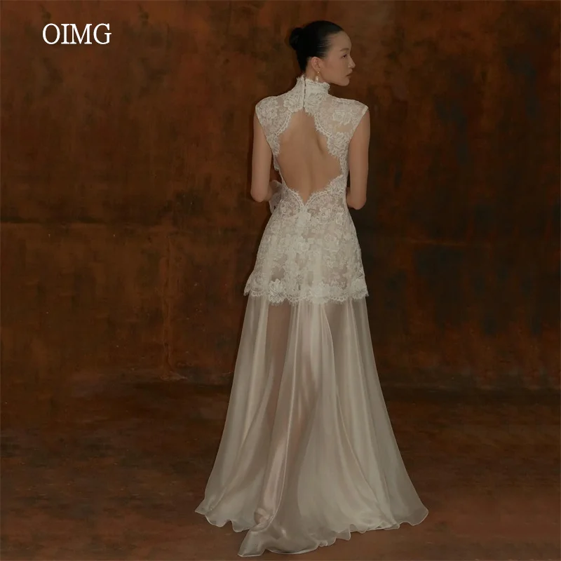 OIMG Modern Lace High Neck A Line Wedding Dress Sleeveless Backless Bride Dresses Floor Length Wedding Gowns 2026 Customized
OIMG Modern Lace High Neck A Line Wedding Dress Sleeveless Backless Bride Dresses Floor Length Wedding Gowns 2026 Customized