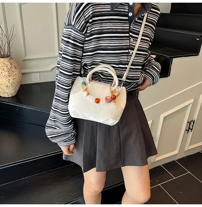 Однотонная сумка премиум-класса с текстурой, сумка через плечо из искусственной кожи, изысканная женская маленькая квадратная сумка с жемчужной цепочкой, кожаная мини-сумка, новинка
Однотонная сумка премиум-класса с текстурой, сумка через плечо из искусственной кожи, изысканная женская маленькая квадратная сумка с жемчужной цепочкой, кожаная мини-сумка, новинка