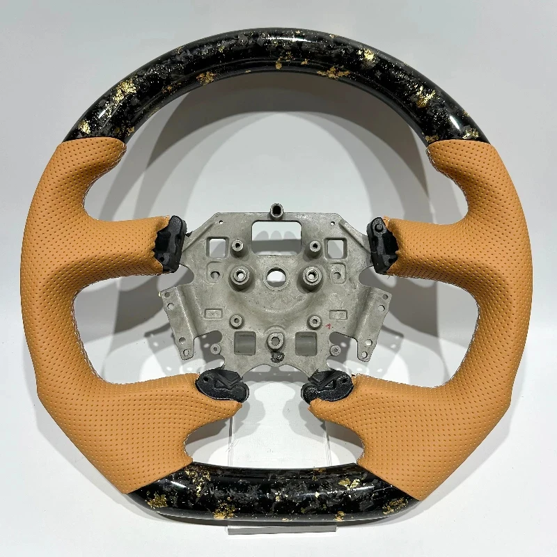 Suitable Yellow perforated leather steering wheel with gold forged carbon fiber Falcon - Durable Performance Auto A
Suitable Yellow perforated leather steering wheel with gold forged carbon fiber Falcon - Durable Performance Auto A