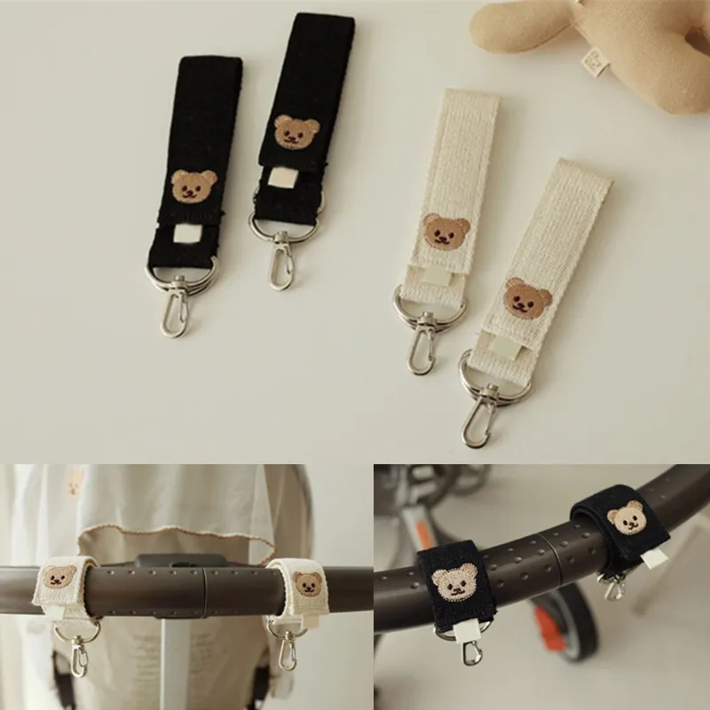 2 pcs Safety Baby Stroller Hooks Adjustable Cartoon Bear Pram Hanging Hooks Universal Armrest Hook Stroller Accessories
2 pcs Safety Baby Stroller Hooks Adjustable Cartoon Bear Pram Hanging Hooks Universal Armrest Hook Stroller Accessories