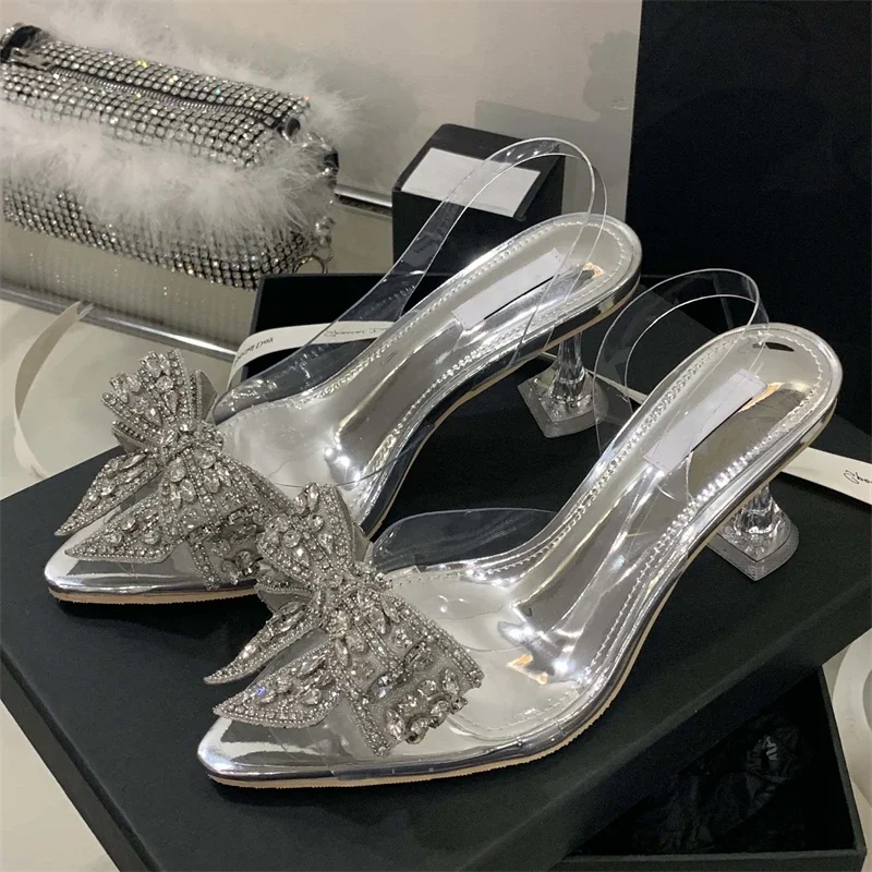 Women's Pointed Toe Rhinestone Bow Decor Transparent PVC Clear Heel Slingback Sandals Elegant Party Footwear Drop Shipping Gift
Women's Pointed Toe Rhinestone Bow Decor Transparent PVC Clear Heel Slingback Sandals Elegant Party Footwear Drop Shipping Gift