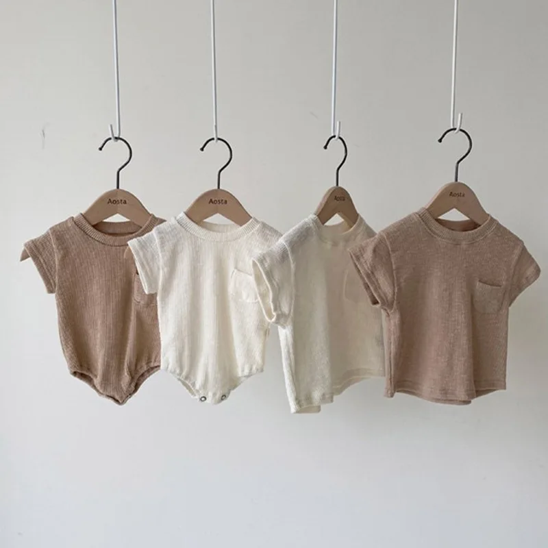 2024 Korean Version of Children's T-shirt Summer Baby Clothes Solid Color Triangle Bag Fart Romper Baby Short-sleeved
2024 Korean Version of Children's T-shirt Summer Baby Clothes Solid Color Triangle Bag Fart Romper Baby Short-sleeved