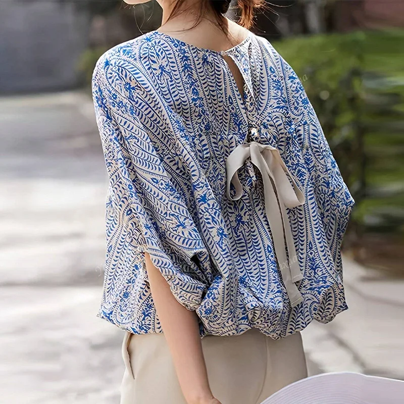 UOOZEE женские винтажные элегантные блузки на шнуровке с цветочным принтом, новинка 2025, свободные повседневные повседневные футболки с короткими рукавами, топы 
UOOZEE женские винтажные элегантные блузки на шнуровке с цветочным принтом, новинка 2025, свободные повседневные повседневные футболки с короткими рукавами, топы