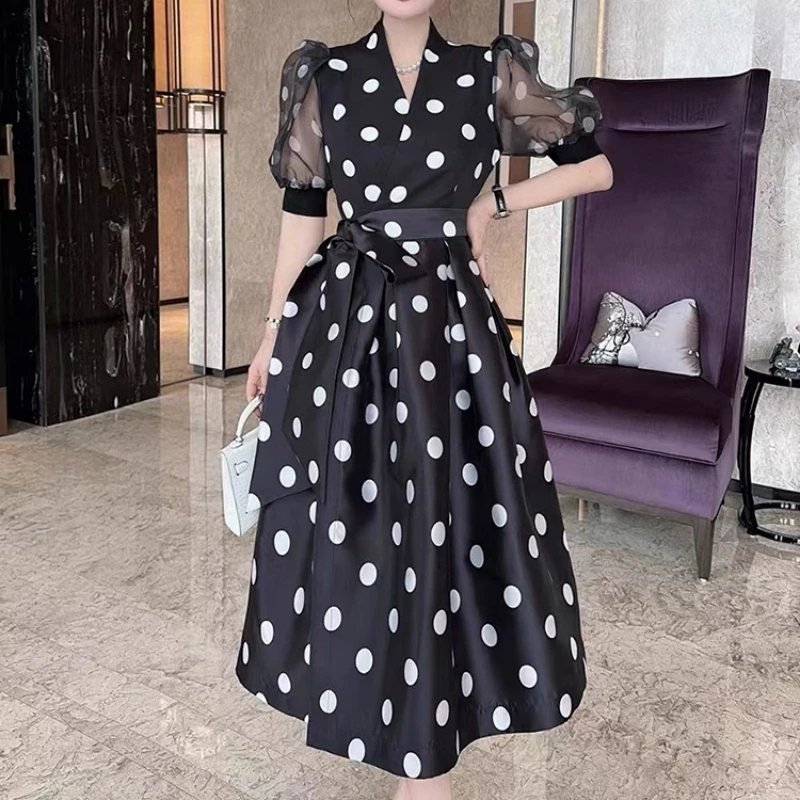 Autumn New Female High Waist Polka Dot Short Sleeve Maxi Dress Summer V-Neck Lace-Up Fashion Elegant Women's Clothing
Autumn New Female High Waist Polka Dot Short Sleeve Maxi Dress Summer V-Neck Lace-Up Fashion Elegant Women's Clothing