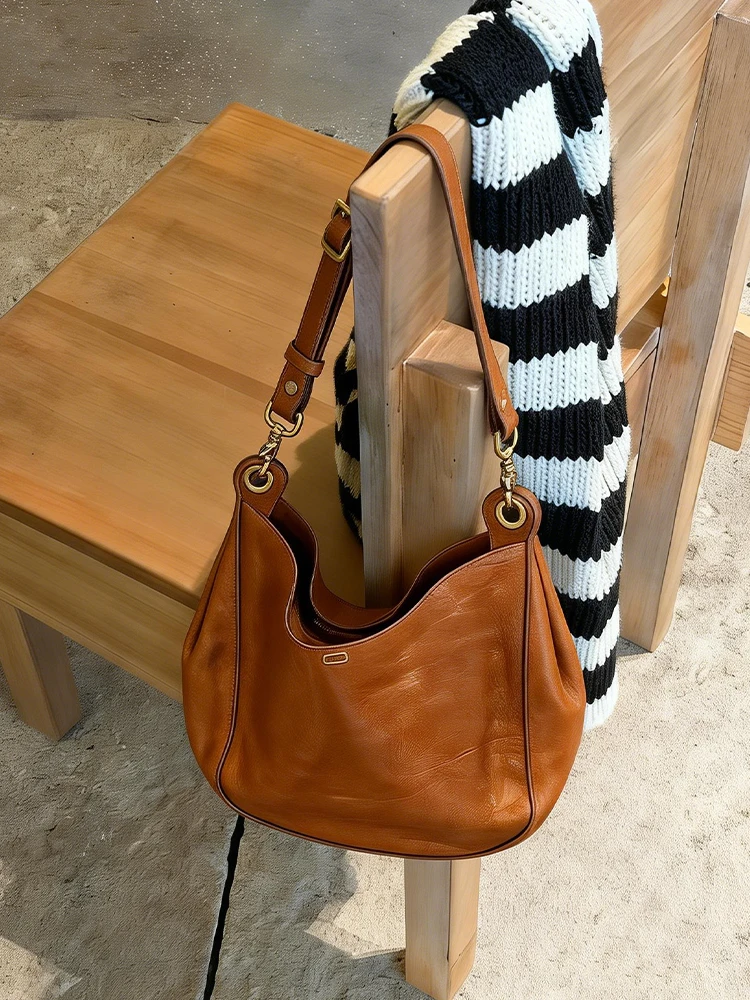 Orange Retro Tote Bag Women's 2026 New High-End Lightweight Luxury Crossbody Bag Summer Bucket Shape Single Shoulder Strap
Orange Retro Tote Bag Women's 2026 New High-End Lightweight Luxury Crossbody Bag Summer Bucket Shape Single Shoulder Strap