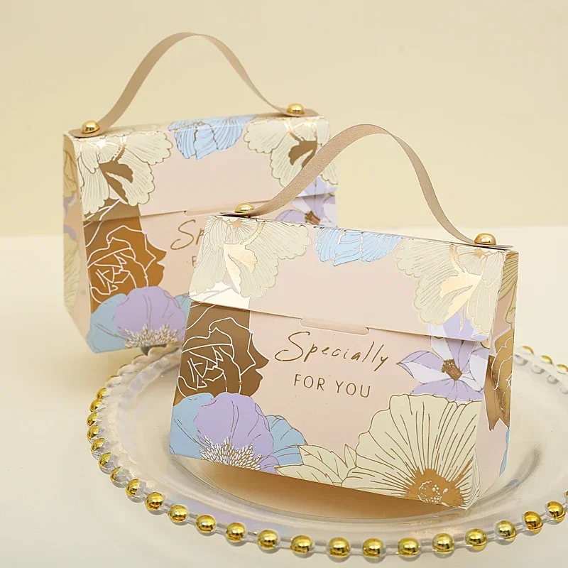 20 Pcs/Lot Creative New Handbag Shape Wedding Candy Box Festive Supplies Exquisite Printing Small Gift Packaging Paper Box
20 Pcs/Lot Creative New Handbag Shape Wedding Candy Box Festive Supplies Exquisite Printing Small Gift Packaging Paper Box