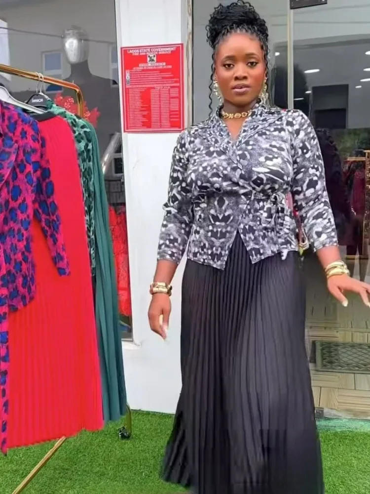 Miyake Pleated Leopard Print Suit Collar with Tie Up Long Sleeved Top, High Waist Long Half Skirt Two-piece Set Women 2025 New
Miyake Pleated Leopard Print Suit Collar with Tie Up Long Sleeved Top, High Waist Long Half Skirt Two-piece Set Women 2025 New