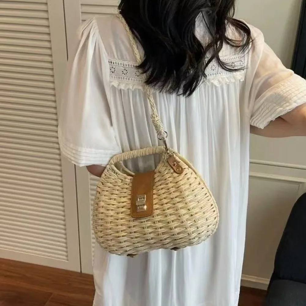 Elegant Straw Woven Shoulder Bag Metal Buckle Eco-Friendly Boho Crossbody Bag All-match Solid Color Wicker Rattan Handbag
Elegant Straw Woven Shoulder Bag Metal Buckle Eco-Friendly Boho Crossbody Bag All-match Solid Color Wicker Rattan Handbag