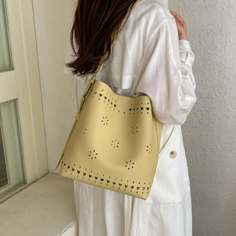 Fashion Hollow Bucket shoulder bag for women handbag Brands PU leather female Crossbody bag Ladies Totes Bag bolsa feminina
Fashion Hollow Bucket shoulder bag for women handbag Brands PU leather female Crossbody bag Ladies Totes Bag bolsa feminina