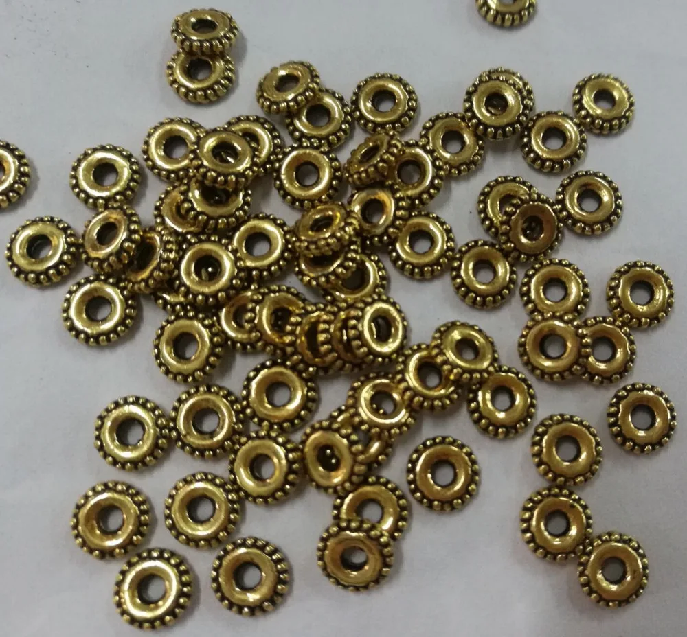 100pcs 6mm,HOLE:1MM DARK gold color round crafted spacer beads in 6mm wide H0864
100pcs 6mm,HOLE:1MM DARK gold color round crafted spacer beads in 6mm wide H0864