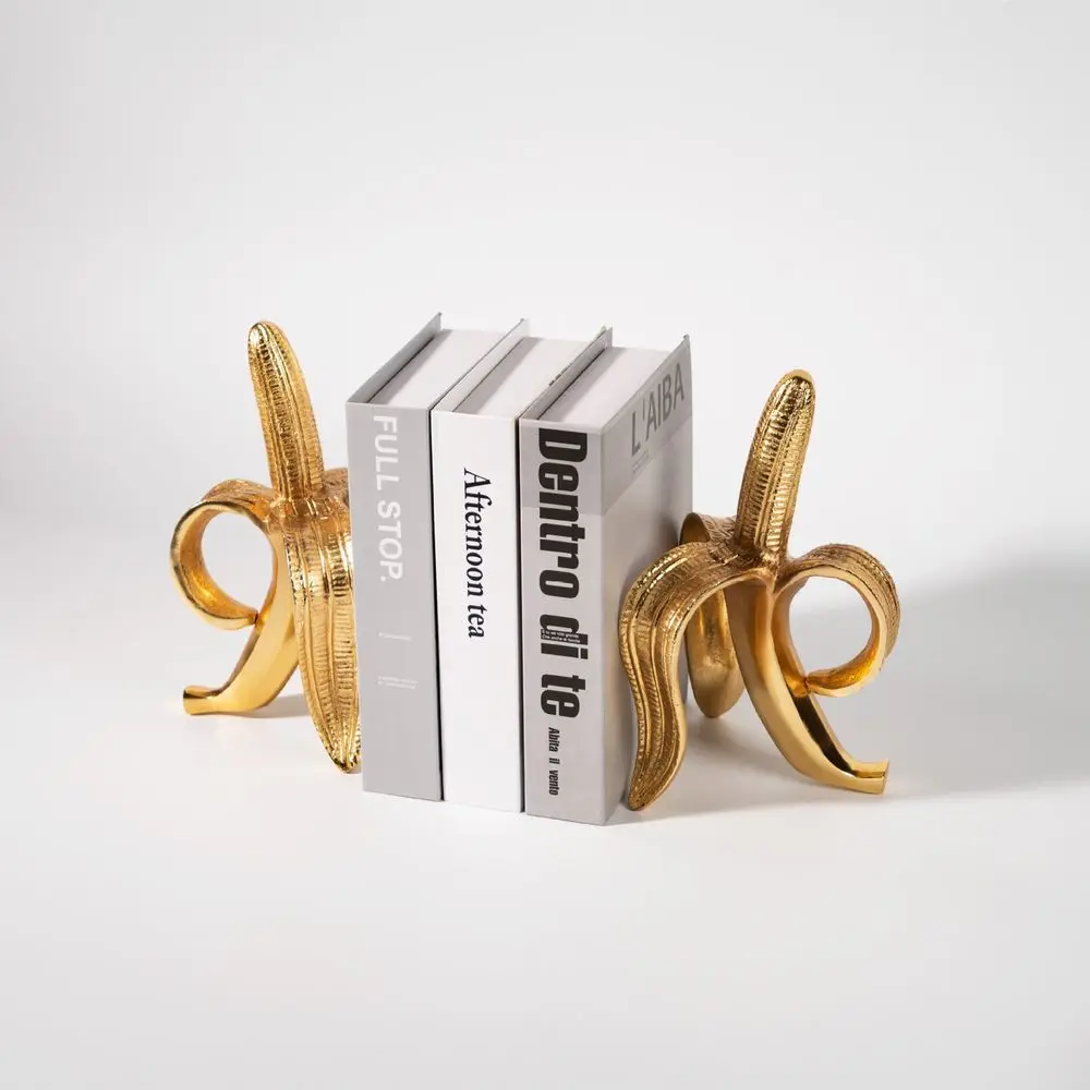 Подставки для книг в европейском стиле ручной работы из смолы с золотым покрытием в форме банана, для офиса, кабинета, рабочего стола, домашние аксессуары
Подставки для книг в европейском стиле ручной работы из смолы с золотым покрытием в форме банана, для офиса, кабинета, рабочего стола, домашние аксессуары