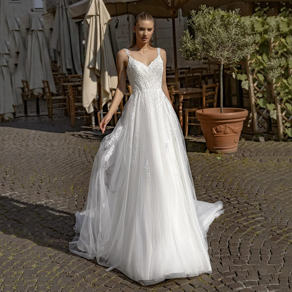 Boho A-Line Wedding Dresses Sleeveless Lace Applique Tulle Bridal Gown V Neck Open Back Chapel Train Bride Dresses Customized
Boho A-Line Wedding Dresses Sleeveless Lace Applique Tulle Bridal Gown V Neck Open Back Chapel Train Bride Dresses Customized