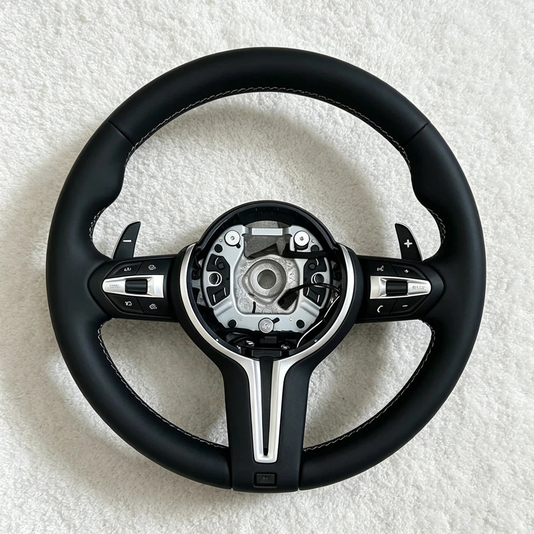Leather Steering Wheel for BMW M3 F30 F31 F32 F33 F34 F35 F36 F15 F16 F20 F21 F22 F25 F44 F48 F49 M5 F10 F18 F06 F12 E71 E84 E90
Leather Steering Wheel for BMW M3 F30 F31 F32 F33 F34 F35 F36 F15 F16 F20 F21 F22 F25 F44 F48 F49 M5 F10 F18 F06 F12 E71 E84 E90