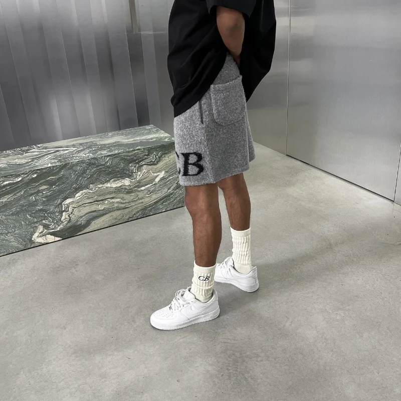White Grey Black Cole Letters Jacquard Logo Wool Shorts Top Quality Mens Womens Shorts Summer Loose Casual Drawstring Pants
White Grey Black Cole Letters Jacquard Logo Wool Shorts Top Quality Mens Womens Shorts Summer Loose Casual Drawstring Pants