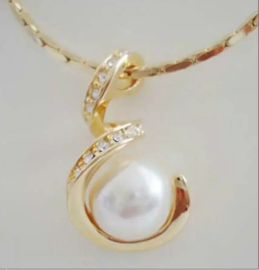 Genuine 12mm White South Sea Shell Pearl Gold Plated Jewelry Pendant Necklace
Genuine 12mm White South Sea Shell Pearl Gold Plated Jewelry Pendant Necklace