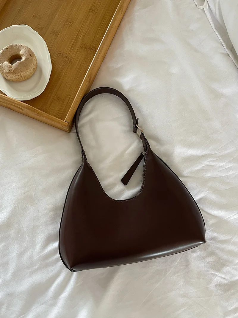 Korean version niche handbag women's bag French stick crescent bag women's shoulder bag women's handbag high-end fashion bag
Korean version niche handbag women's bag French stick crescent bag women's shoulder bag women's handbag high-end fashion bag