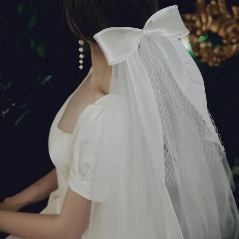 Bride's veil Double layer vintage bow knot Sen series travel photography light gauze Short wedding veil Small head dress Wedding
Bride's veil Double layer vintage bow knot Sen series travel photography light gauze Short wedding veil Small head dress Wedding