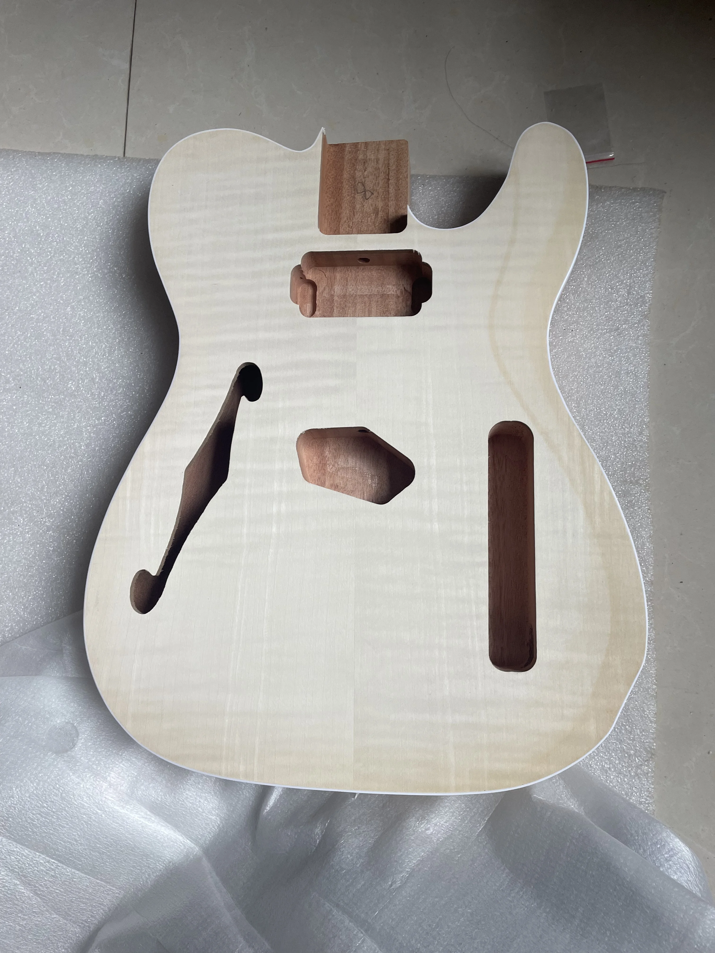 Unfinished Electric Guitar Body Mahogany Flame Maple Veneer TL-T02 Guitarra Barrel for TL Style DIY Parts Guitar Accessories
Unfinished Electric Guitar Body Mahogany Flame Maple Veneer TL-T02 Guitarra Barrel for TL Style DIY Parts Guitar Accessories