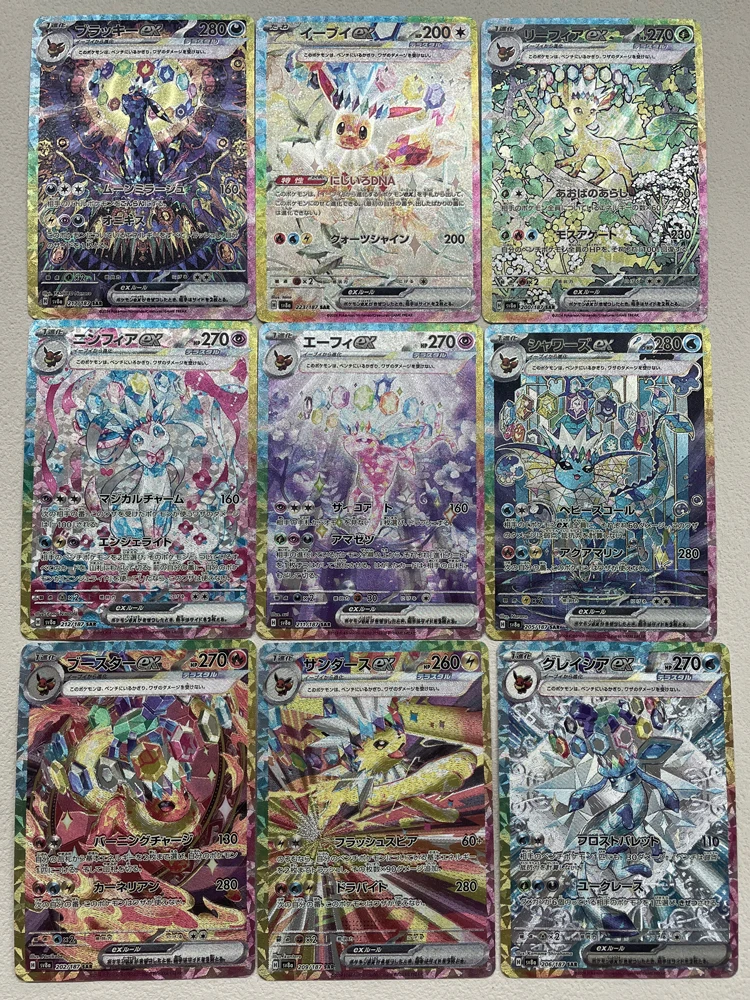 9 шт. DIY Pokemon Eeveelution EX карты Sylveon Umbreon Espeon Leafeon Коллекция Pokemon PTCG карты Коллекция линз игры в подарок
9 шт. DIY Pokemon Eeveelution EX карты Sylveon Umbreon Espeon Leafeon Коллекция Pokemon PTCG карты Коллекция линз игры в подарок