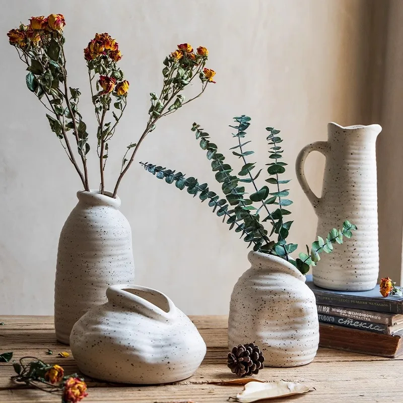 Ceramic ornament living room dried flower vase tv cabinet model room home desktop creative vase
Ceramic ornament living room dried flower vase tv cabinet model room home desktop creative vase