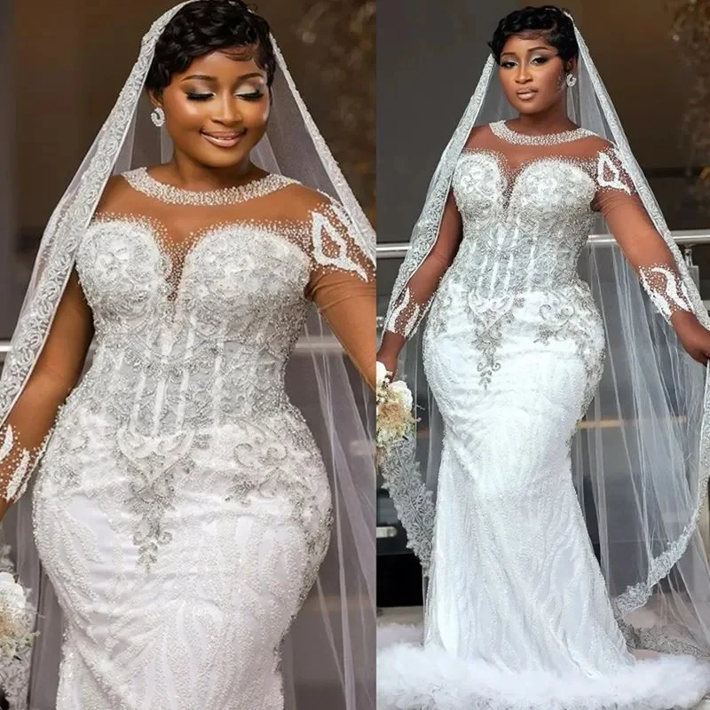Customize Plus Size Mermaid Wedding Dress Bridal Gowns Illusion Sheer Neck Long Sleeves Lace Tulle Crystal Bridal Gowns
Customize Plus Size Mermaid Wedding Dress Bridal Gowns Illusion Sheer Neck Long Sleeves Lace Tulle Crystal Bridal Gowns
