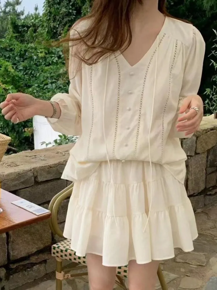 Casual Beige Vacation Spring Summer Outfits Lantern Sleeve Blouse And Short Skirt Two Piece Set 2025 New Top Pleat Skirt Suit
Casual Beige Vacation Spring Summer Outfits Lantern Sleeve Blouse And Short Skirt Two Piece Set 2025 New Top Pleat Skirt Suit