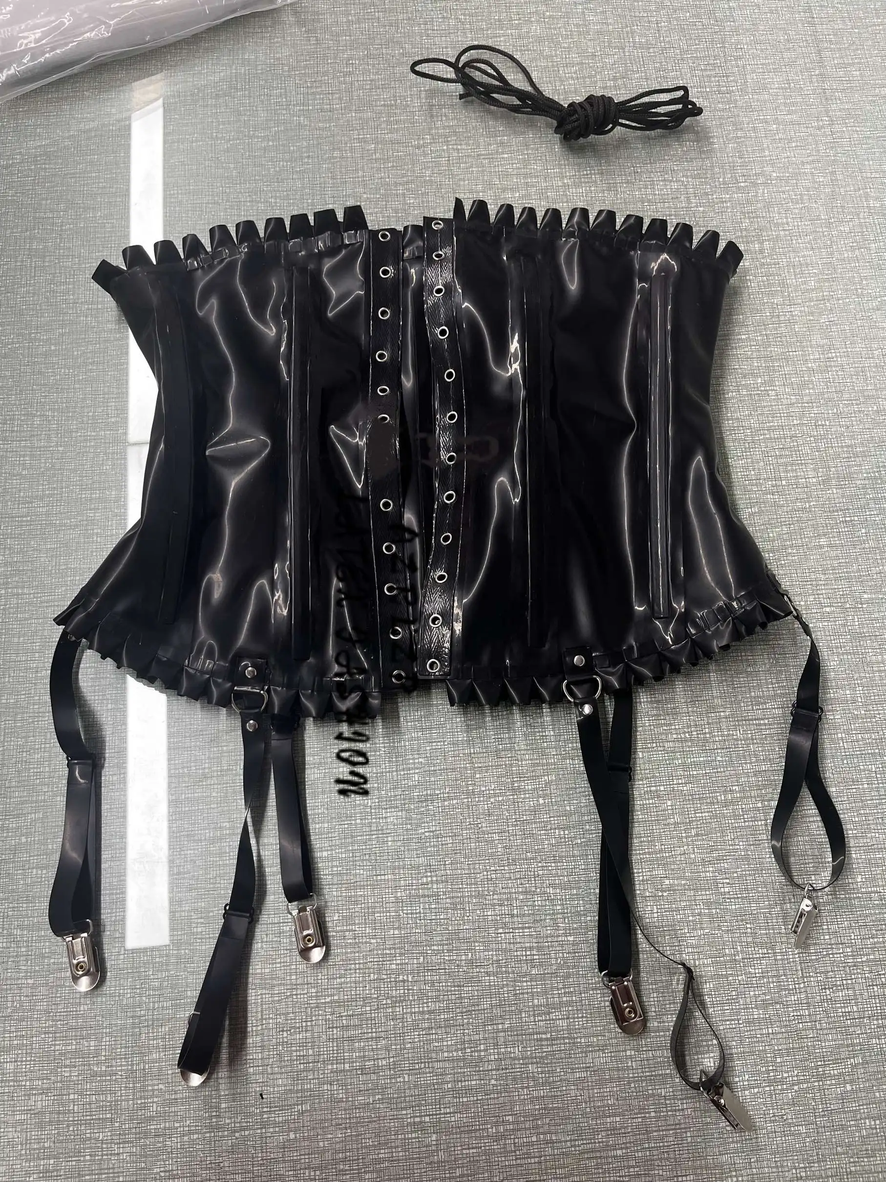 0.6mm Thick Latex Corset with Ruffle Trim and Rubber Garter Straps
0.6mm Thick Latex Corset with Ruffle Trim and Rubber Garter Straps