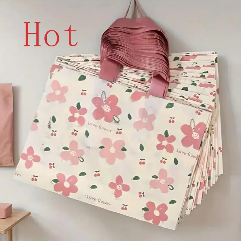 50pcs Flower Clothing Storage Bag Thick Plastic Hand-held Shopping Bags Gift Packing for Children's Clothing Tote Pocket
50pcs Flower Clothing Storage Bag Thick Plastic Hand-held Shopping Bags Gift Packing for Children's Clothing Tote Pocket
