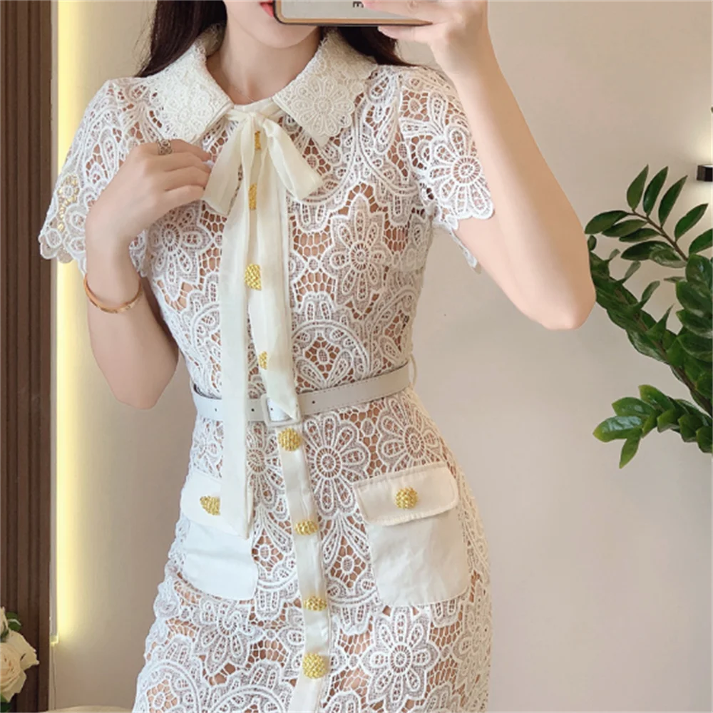 Lace spliced split dress long dress single-breasted button hollowed-out and elegant women
Lace spliced split dress long dress single-breasted button hollowed-out and elegant women
