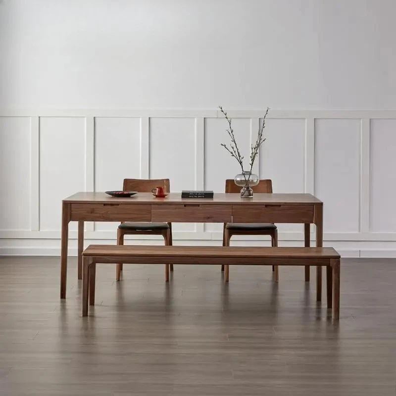 Большой обеденный стол из массива черного ореха, современный, простой, с выдвижными ящиками.
Большой обеденный стол из массива черного ореха, современный, простой, с выдвижными ящиками.