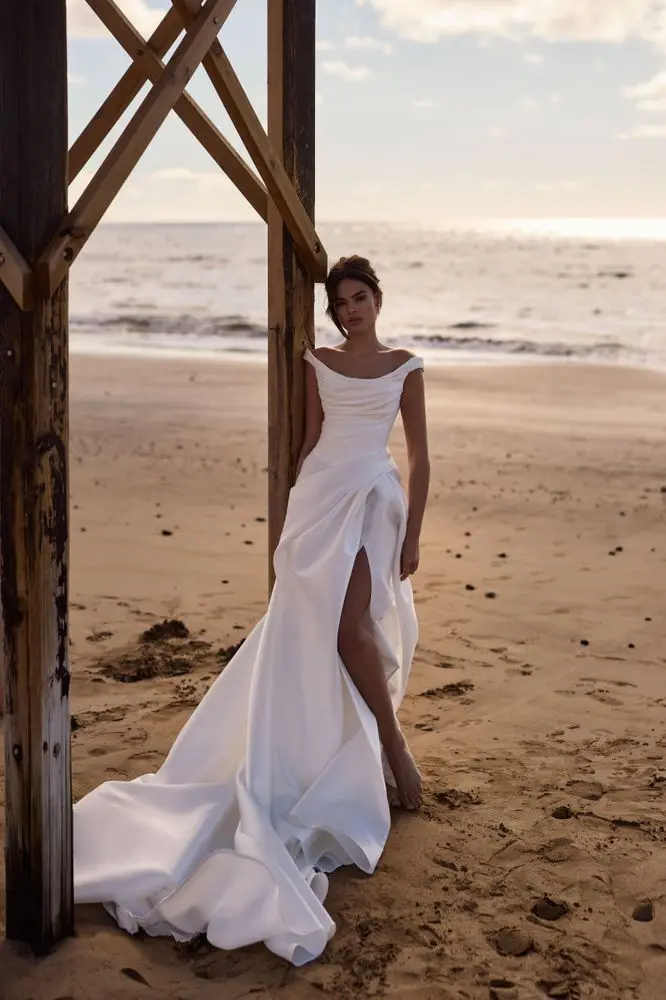 2026 Off Shoulder Satin Mermaid Wedding Dress with High Slit Ruched Bridal Gown Elegant Court Train Custom Made Vestido De Novia
2026 Off Shoulder Satin Mermaid Wedding Dress with High Slit Ruched Bridal Gown Elegant Court Train Custom Made Vestido De Novia