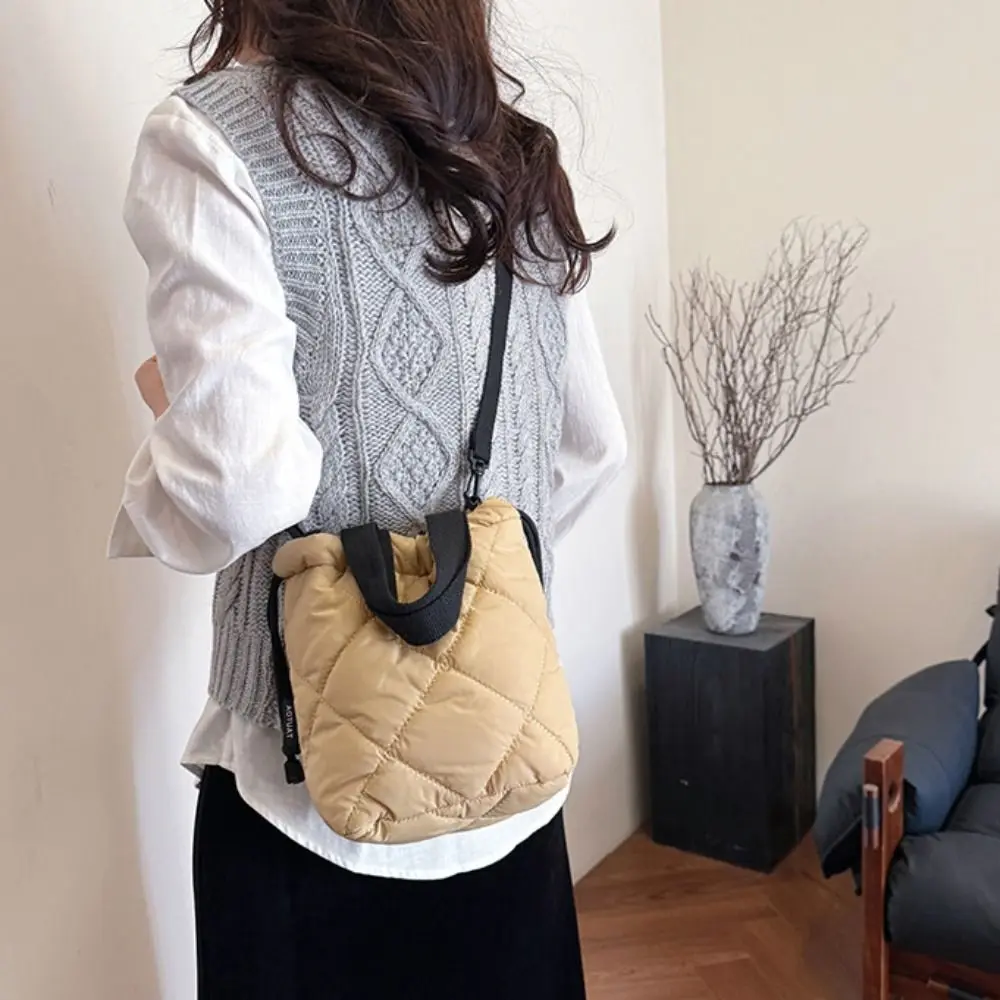 Elegant Drawstring Bucket Bag Solid Color Lightweight Nylon Shoulder Bag Handbag Large Capacity Down Crossbody Bag Coin Purse
Elegant Drawstring Bucket Bag Solid Color Lightweight Nylon Shoulder Bag Handbag Large Capacity Down Crossbody Bag Coin Purse