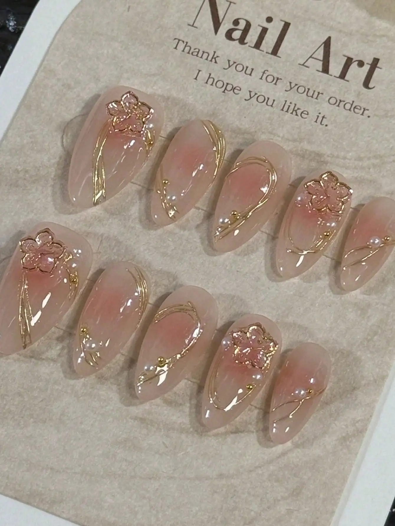 10pcs Handmade Press-On Nail Stickers, Almond Shape with Gold Floral Trim. Lightweight, Luxurious & Elegant. Removable & Reusable. For Daily Wear. Great Gift for Women.
10pcs Handmade Press-On Nail Stickers, Almond Shape with Gold Floral Trim. Lightweight, Luxurious & Elegant. Removable & Reusable. For Daily Wear. Great Gift for Women.