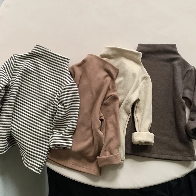 Children Australian velvet shirt autumn and winter boys half -high led warm shirt Girl Korean version versatile elastic shirt
Children Australian velvet shirt autumn and winter boys half -high led warm shirt Girl Korean version versatile elastic shirt