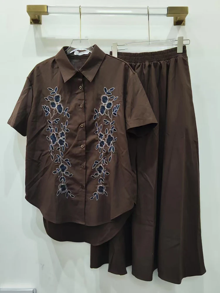 2025 Summer Women's retro embroidered lapel short-sleeved shirt two-piece set + loose-fitting waist skirt fashion set
2025 Summer Women's retro embroidered lapel short-sleeved shirt two-piece set + loose-fitting waist skirt fashion set