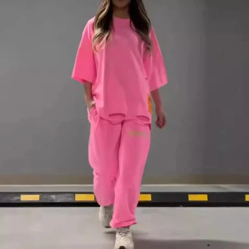 Spring and Summer European and American Women's Loose Hollow Round Neck T-shirt Top Casual Pants Two-piece Set
Spring and Summer European and American Women's Loose Hollow Round Neck T-shirt Top Casual Pants Two-piece Set