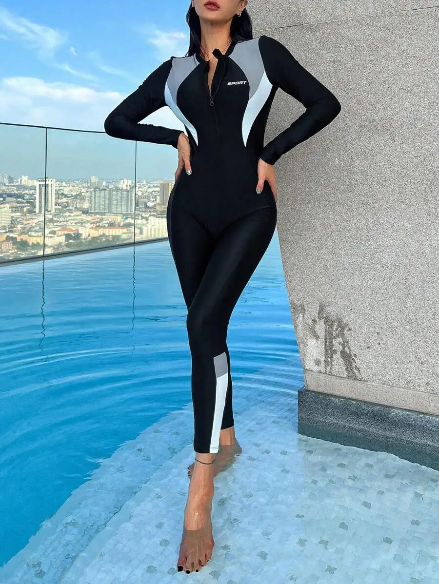 Women Zipper Front Long Sleeve One-Piece Sporty Swimsuit Color Block Design
Women Zipper Front Long Sleeve One-Piece Sporty Swimsuit Color Block Design