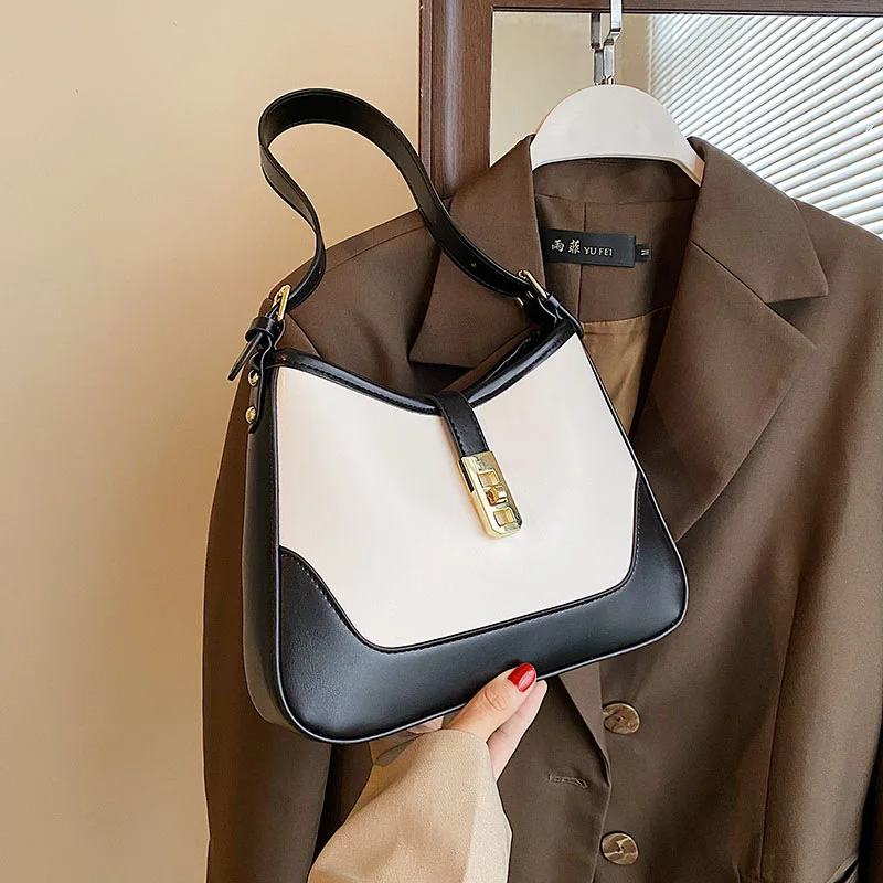 European and American fashion underarm splicing niche women's bag commuting shoulder bag texture crossbody stylish lock buckle
European and American fashion underarm splicing niche women's bag commuting shoulder bag texture crossbody stylish lock buckle