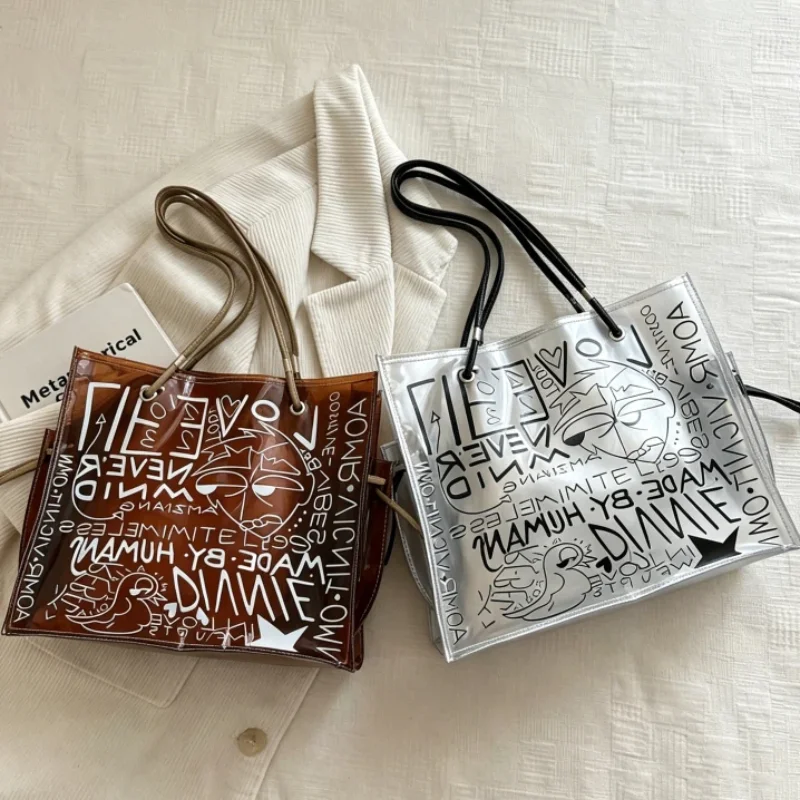 Transparent Jelly Tote Bag Summer New Fashion Letter Print Graffiti Handbag 2in1 Large Capacity Commuter Shopping Shoulder Bag
Transparent Jelly Tote Bag Summer New Fashion Letter Print Graffiti Handbag 2in1 Large Capacity Commuter Shopping Shoulder Bag