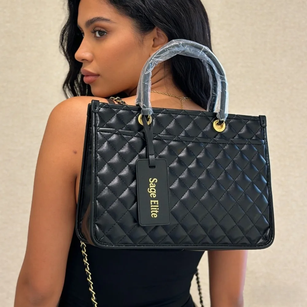 Черная стеганая сумка через плечо Sage Elite, женская стильная просторная повседневная сумка через плечо 30 × 23 × 11 см
Черная стеганая сумка через плечо Sage Elite, женская стильная просторная повседневная сумка через плечо 30 × 23 × 11 см