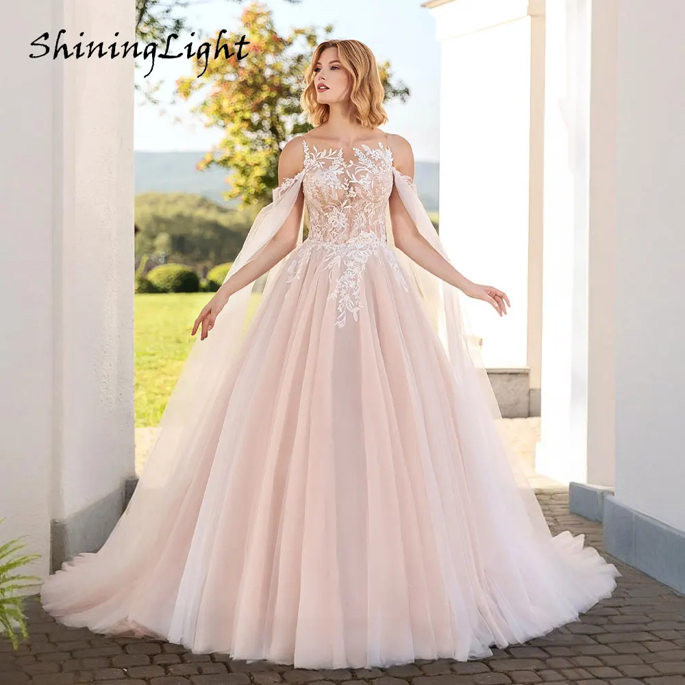 ShiningLight Romantic Blush Pink Ball Gown Wedding Dress for Bride 2026 Lace Appliques Women Tulle Boho Bride Dress Customied
ShiningLight Romantic Blush Pink Ball Gown Wedding Dress for Bride 2026 Lace Appliques Women Tulle Boho Bride Dress Customied