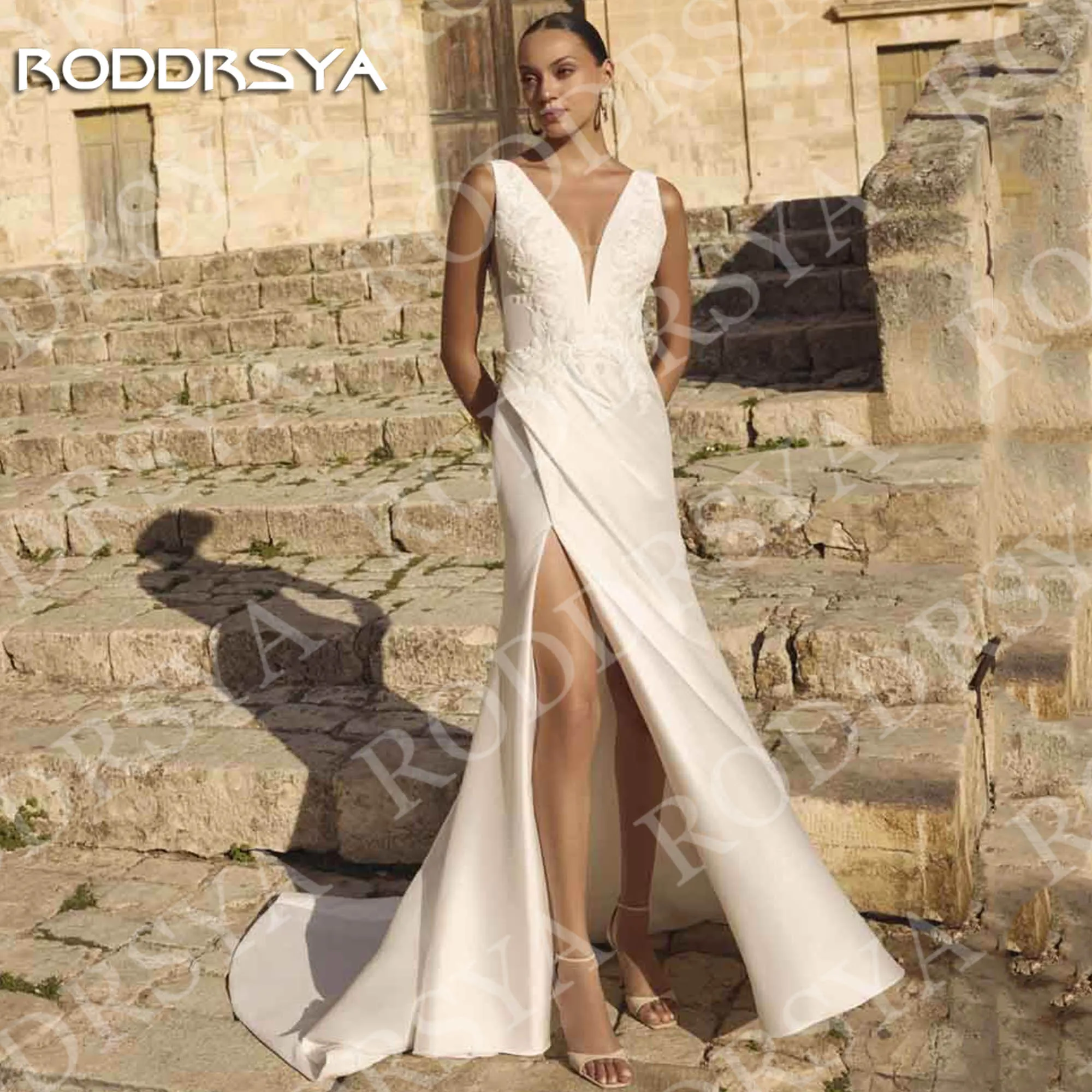 RODDRSYA Elegant V Neck Wedding Dresses for Bride Lace Appliques High Slit Backless Satin Bridal Dress Customized vestido novia
RODDRSYA Elegant V Neck Wedding Dresses for Bride Lace Appliques High Slit Backless Satin Bridal Dress Customized vestido novia