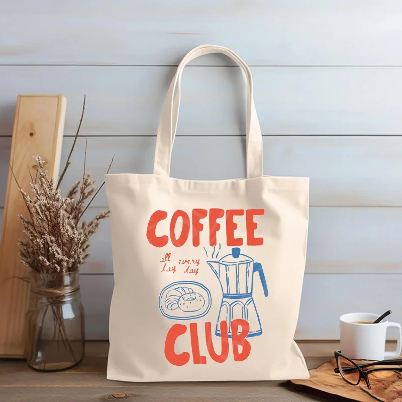 Coffee Club Slogan Women Tote Bag Stylish Beige with Vibrant Coffee Design Large Capacity Zip Closure Perfect for Work Shopping
Coffee Club Slogan Women Tote Bag Stylish Beige with Vibrant Coffee Design Large Capacity Zip Closure Perfect for Work Shopping